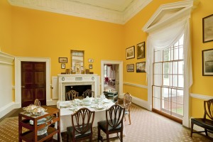 Monticello's Dining Room featured large windows, a skylight, and chrome yellow walls