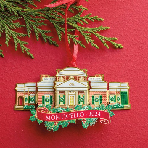 Monticello tree ornament decorated with wreaths and Christmas 2024 written in a scroll at the bottom