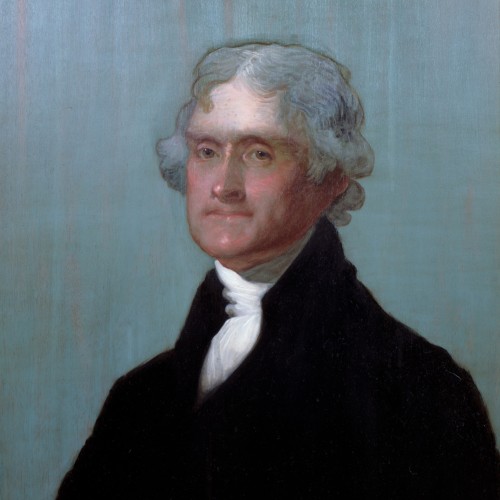 Portrait of a gray-haired Thomas Jefferson in black jacket with a white cloth neckpiece.