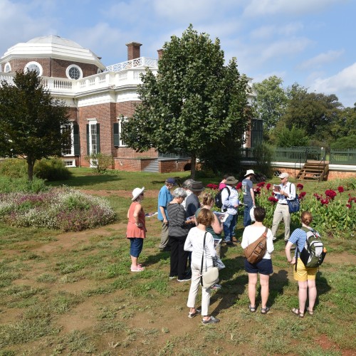 Guests take a Mountaintop Archaeology Walking Tour on Monticello's West Lawn