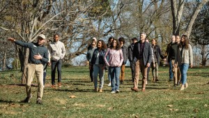 A Monticello guide leads visitors through the Upper Grove on a Garden Tour